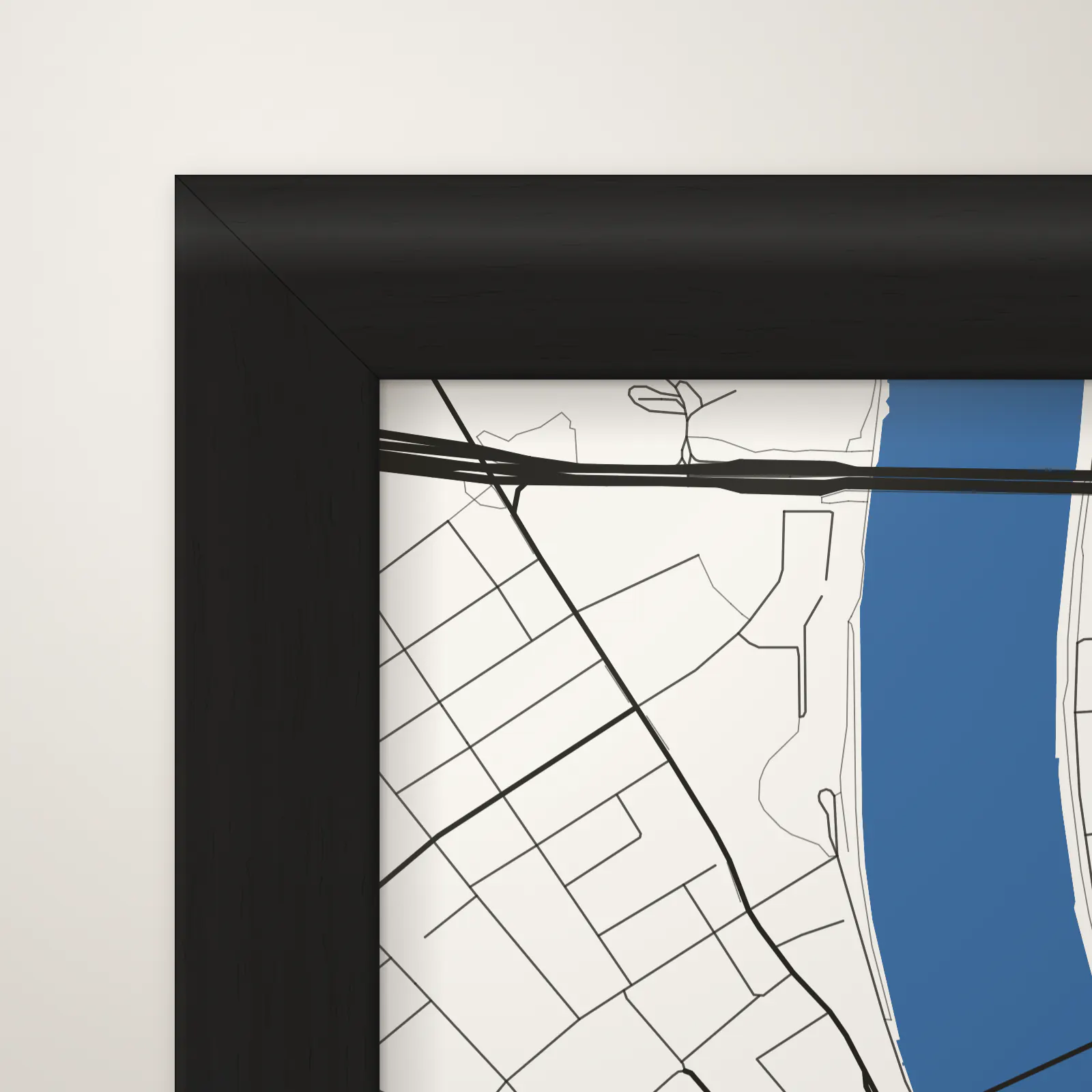 Nahaufnahme: Ecke eines Basel-Posters im Rahmen Schwarz (Erlenholz, schwarz), mit Acrylglas